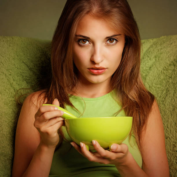 istock girl with green bowl 108354939