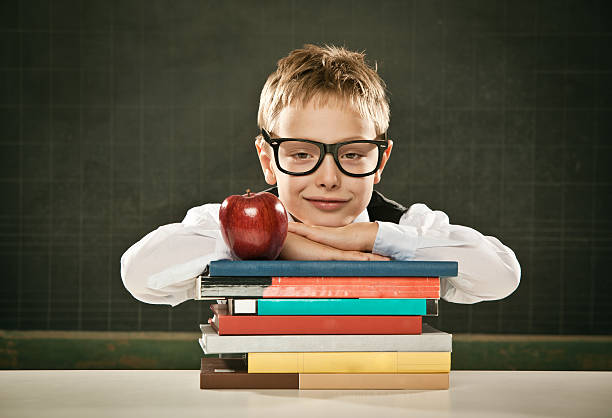 istock beautiful toothless school student kid with blackboard books and 108354973