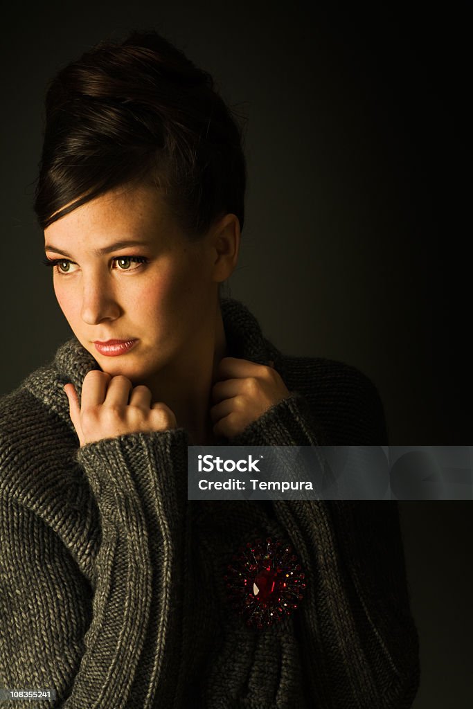 Beautiful woman's portrait in warm light. Vertical  Brown Hair Stock Photo