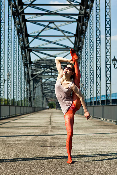 istock young flexible woman outdoor 108355370