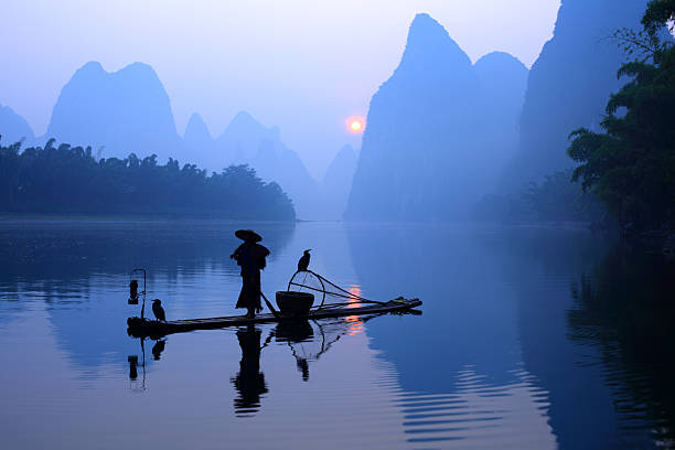 Fisherman on Li River stock photo