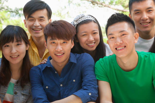istock Group of Chinese friends smiling 1083554942