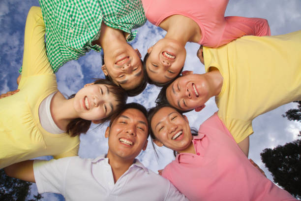 istock Group of Chinese friends smiling together 1083554962