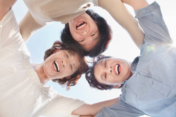 istock Older Chinese woman standing in circle 1083555312