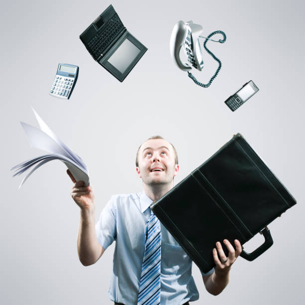 istock Happy Juggling Businessman 108355620