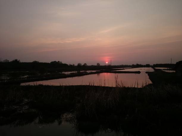istock sunset in the village 1083556418
