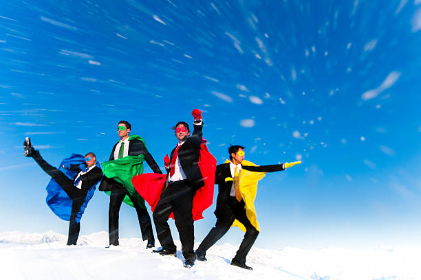 Superhero Businessmen on a Winters Mountain Peak  stars in your eyes stock pictures, royalty-free photos & images