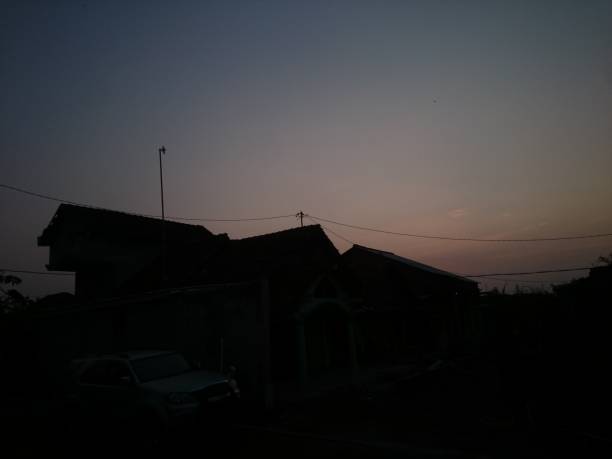 istock sunset in the village 1083557208