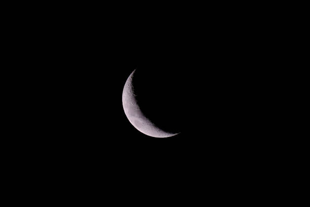 istock Crescent moon with visible craters, in the andean precordillera pre-mountain range, Uspallata, Mendoza, Argentina 1083558710