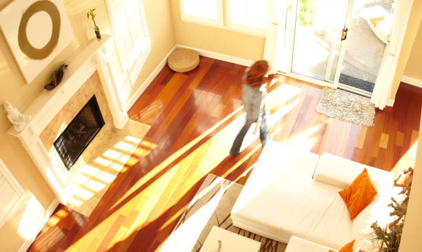 istock Blurred woman walking through modern living room from above 108355984