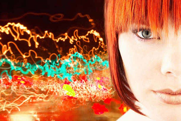 Cropped Portrait Of Young Woman Against Green Background