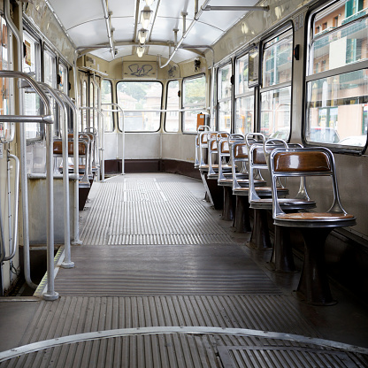 Interior of vintage tram in Turin. Italy. Grainy added for the mood.