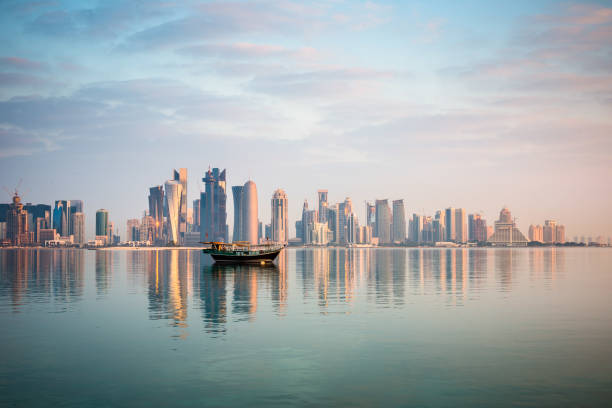 Fishing boats in the waters of the Gulf, Fishing boats in the waters of the Gulf, on the Corniche Doha Qatar islamic architecture photos stock pictures, royalty-free photos & images