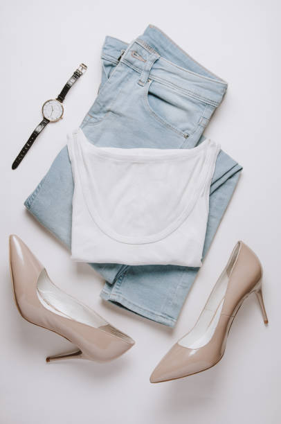 istock Women's clothing on a pale background. Flat lay and top view 1083569668