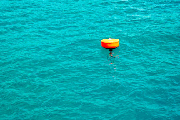 istock Orange buoy on the turquoise sea. 1083575490