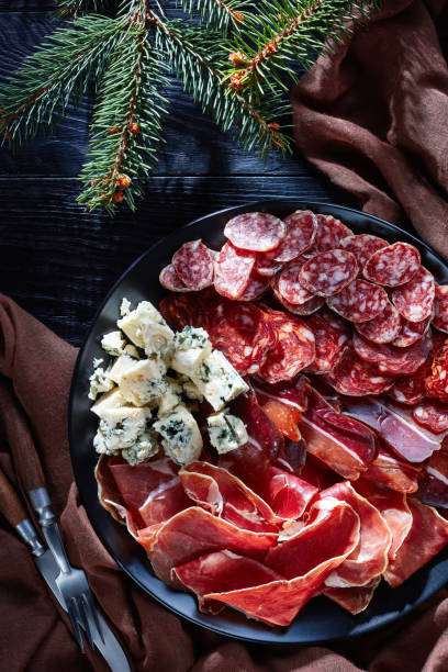 istock cheese, sausages, dry aged pork meat, close-up 1083577400