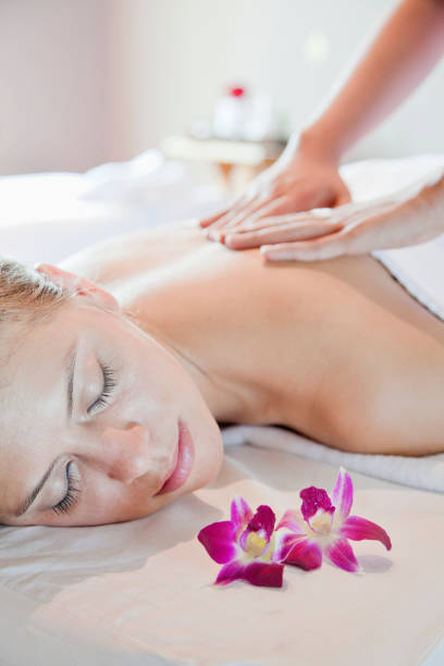 istock Woman having massage in spa 1083577414