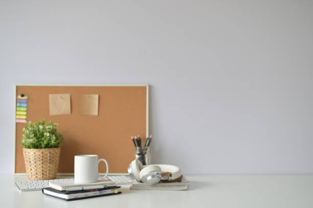 istock Copy space office desk with coffee mug, notebook and office supply with selective focus. 1083580086