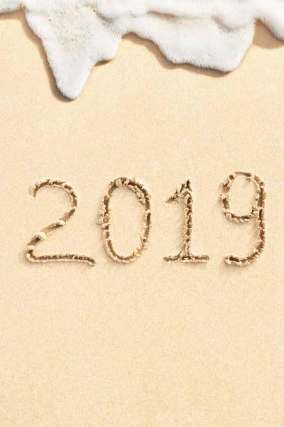 istock New Year 2019 written on the tropical beach 1083584622