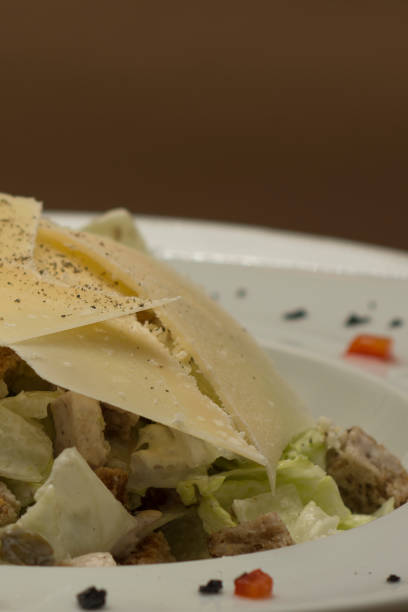 istock Caeser Salad with chicken fillet, white plate 1083590590