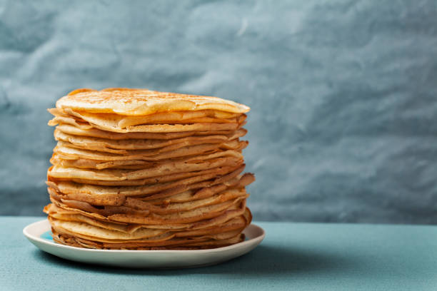 Staple of yeast pancakes, traditional for Russian pancake week Staple of yeast pancakes, traditional for Russian pancake week (Shrove tide) crêpe pancake photos stock pictures, royalty-free photos & images
