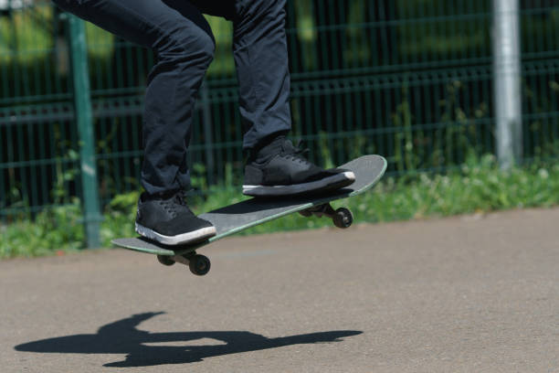istock Young boy skater in the park 1083592720