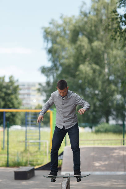 istock Young boy skater in the park 1083592754