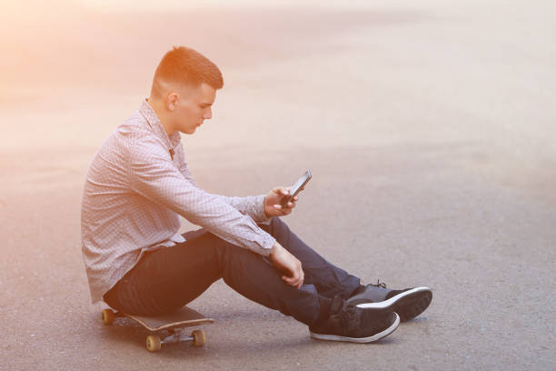 istock Young boy skater in the park 1083592792