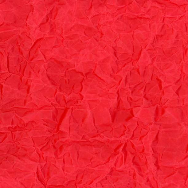 istock red creased paper texture background 1083593094