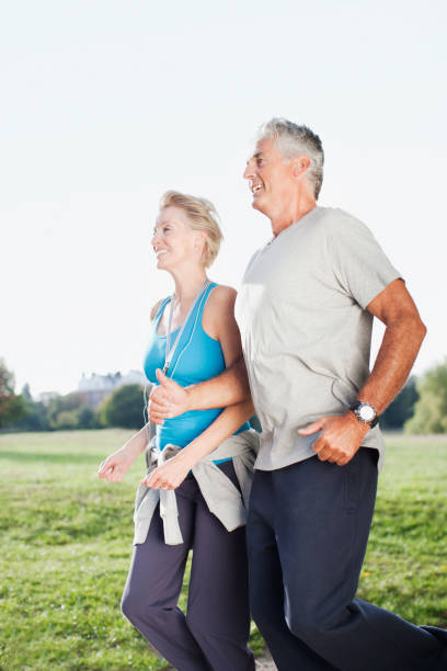 istock Couple jogging together outdoors 108359398