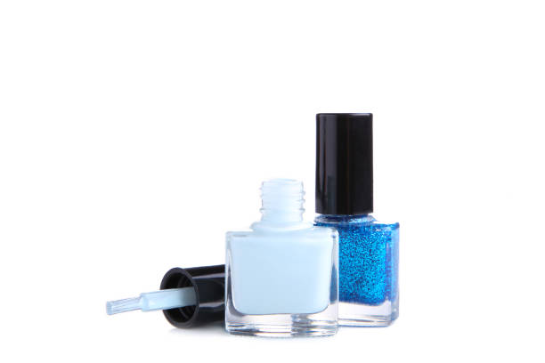 istock Blue nail polishes bottle isolated on white background 1083601792