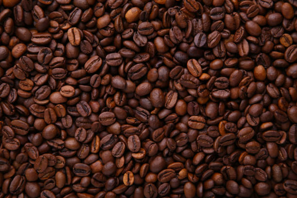 istock Aroma coffee beans background. Close up coffee. 1083606272