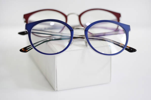 istock Multicolored fashionable glasses on a white case 1083608720