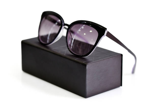 istock Fashionable sunglasses with box on white background 1083608794