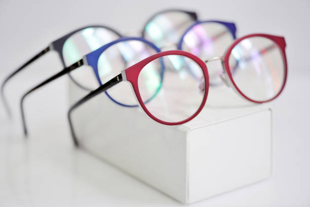 istock Multicolored fashionable glasses on a white case 1083608910