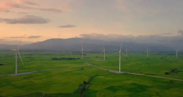 wind turbine in a green field - Energy Production with clean and renewable energy, clean energy concept