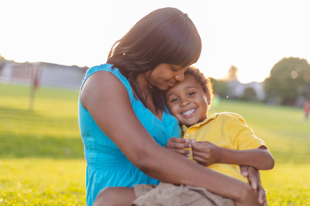 istock Mom and son outside in summer 1083614116