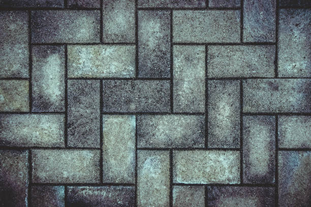 istock Background pavement, paving stone, brick, cobblestone, road, footpath. 1083617224