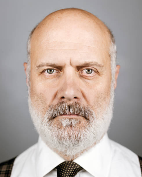 istock Serious businessman posing and staring at the camera 1083617400