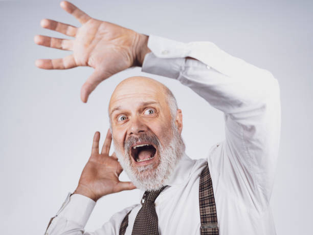 istock Terrified senior man shouting out loud 1083618502
