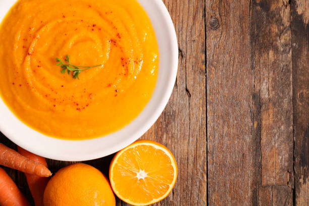 istock carrot and orange soup 1083619108