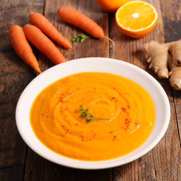 istock carrot and orange soup 1083619132