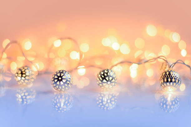 istock Christmas lights on glossy background. Christmas festive background 1083620192