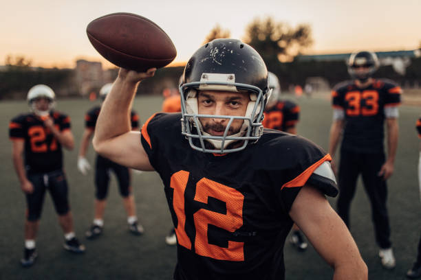 istock American football players on training 1083620530