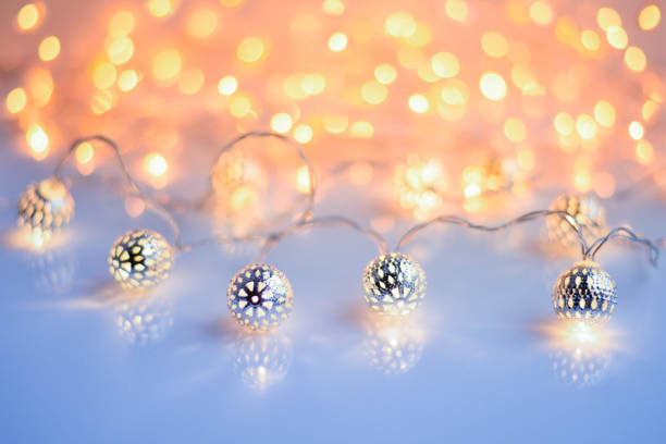 istock Christmas lights on glossy background. Christmas festive background 1083624452