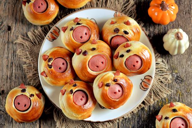 Cute pig buns with sausages - symbol of 2019, the idea for children's breakfast. Cute pig buns with sausages - symbol of 2019, the idea for children's breakfast. funny thanksgiving stock pictures, royalty-free photos & images