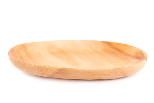 Wooden plate on white background
