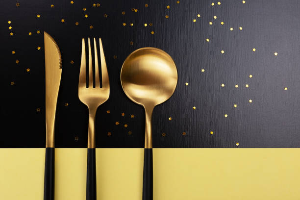 istock Set of black and gold cutlery 1083630540