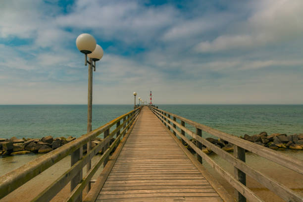 istock Sea bridge / dock in Heiligendamm at Baltic Sea 1083630562