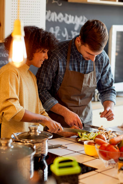 istock Couple Cooking Together 1083630592